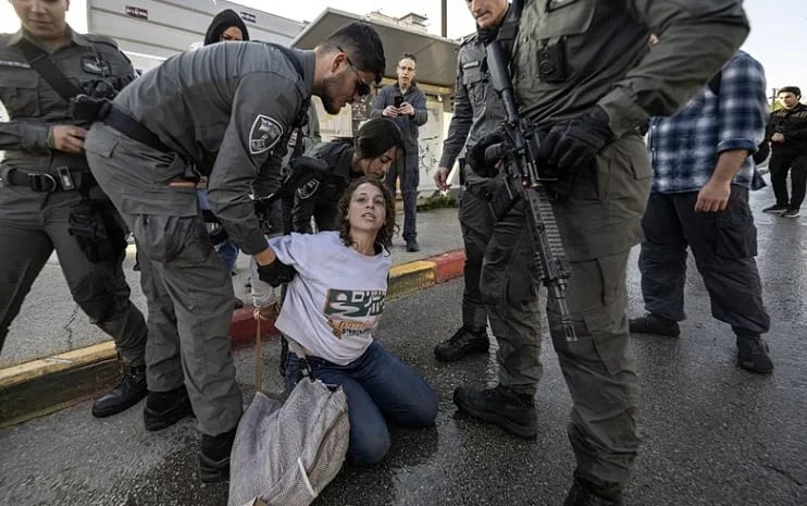 Dozens of protesters gather in front of the Israeli Parliament (Knesset) to demonstrate against a controversial bill that proposes the death penalty for Palestinian prisoners in West Jerusalem on March 31, 2026. (AFP)