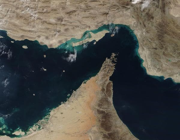 Image caption: In this satellite image provided by NASA, the Strait of Hormuz is shown between the rugged southern coast of Iran, top, and the Musandam Peninsula of Oman, center. This narrow waterway serves as the only sea passage from the Persian Gulf to
