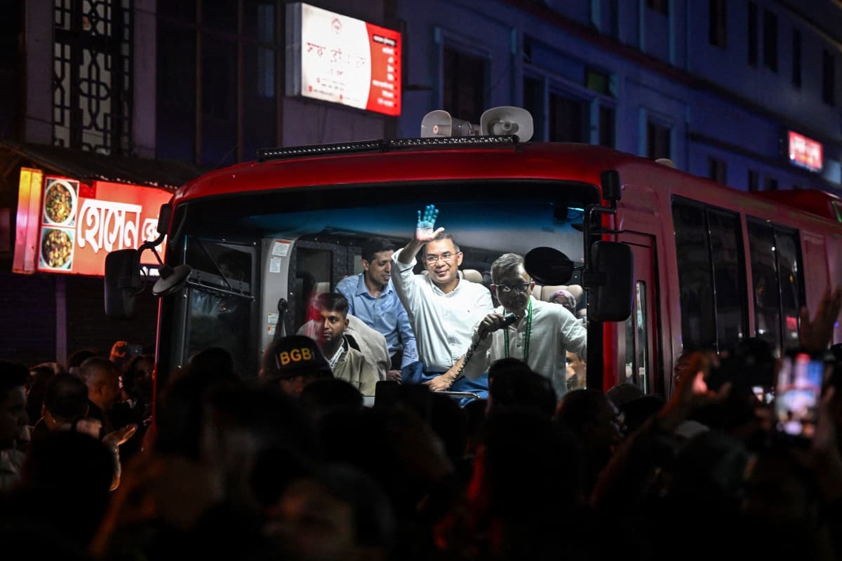 TOPSHOT - Bangladesh Nationalist Party (BNP) chairman Tarique Rahman waves to supporters from a vehicle after visiting the shrine of Sufi saint Hazrat Shahjalal in Sylhet on January 21, 2026, as part of the official launch of his election campaign. (AFP)