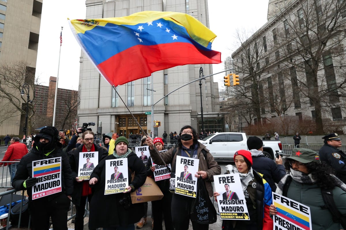 Demonstrators hold signs in support of ousted Venezuelan president Nicolas Maduro outside the Daniel Patrick Moynihan United States Courthouse as Maduro awaits his arraignment hearing on January 5, 2026 in New York. (AFP)