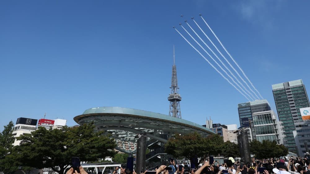 Kawasaki T-4s of the Japan Air Self-Defense Force's Blue Impulse aerobatic demonstration team perform a flypast ahead of the opening ceremony for the 2026 Asian Games in Nagoya on September 19, 2026. (Photo: AFP)