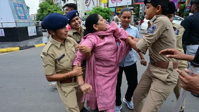 Indian police fire tear gas, baton charge exam protesters