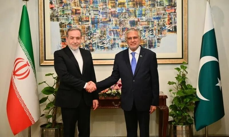 Pakistan's Foreign Minister Ishaq Dar welcomes his Iranian counterpart on arrival at the Ministry of Foreign Affairs on November 5, 2024. (MOFA/X)