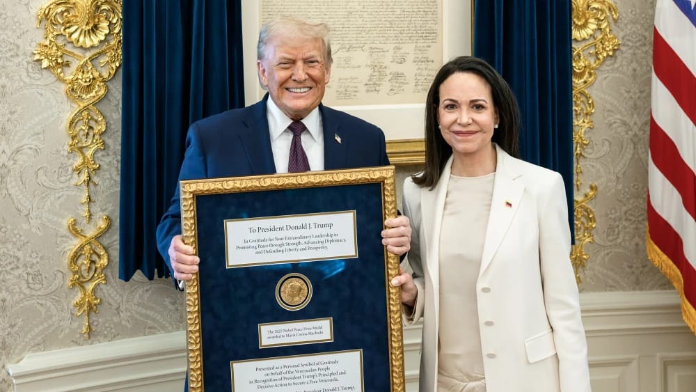 President Donald Trump meets with Venezuelan opposition leader María Corina Machado in the Oval Office on January 15, 2026, where she presents him with her Nobel Peace Prize medal.