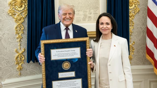 President Donald Trump meets with Venezuelan opposition leader María Corina Machado in the Oval Office on January 15, 2026, where she presents him with her Nobel Peace Prize medal.