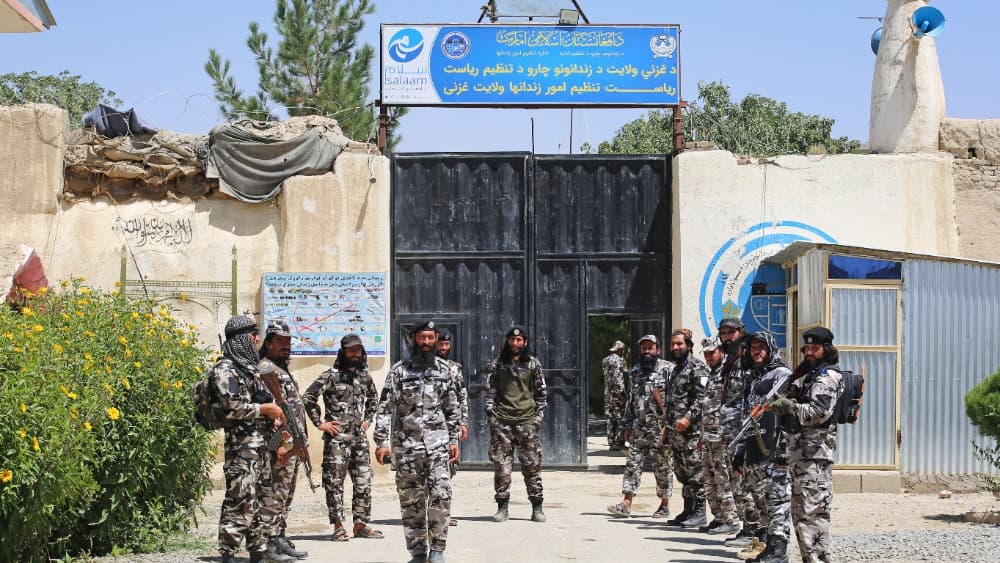 Taliban security personnel stand guard at an entrance of a prison in Afghanistan's Ghazni province on August 27, 2026. (Photo by Mohammad Faisal NAWEED / AFP)