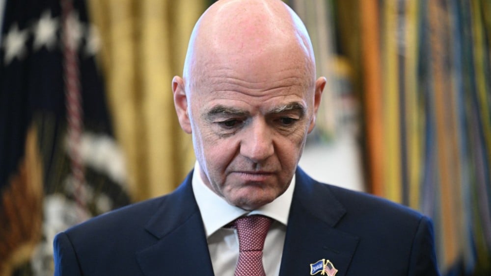FIFA president Gianni Infantino looks on during a meeting with the White House Task Force on the FIFA World Cup 2026 in the Oval Office of the White House in Washington, DC on November 17, 2025 (AFP)