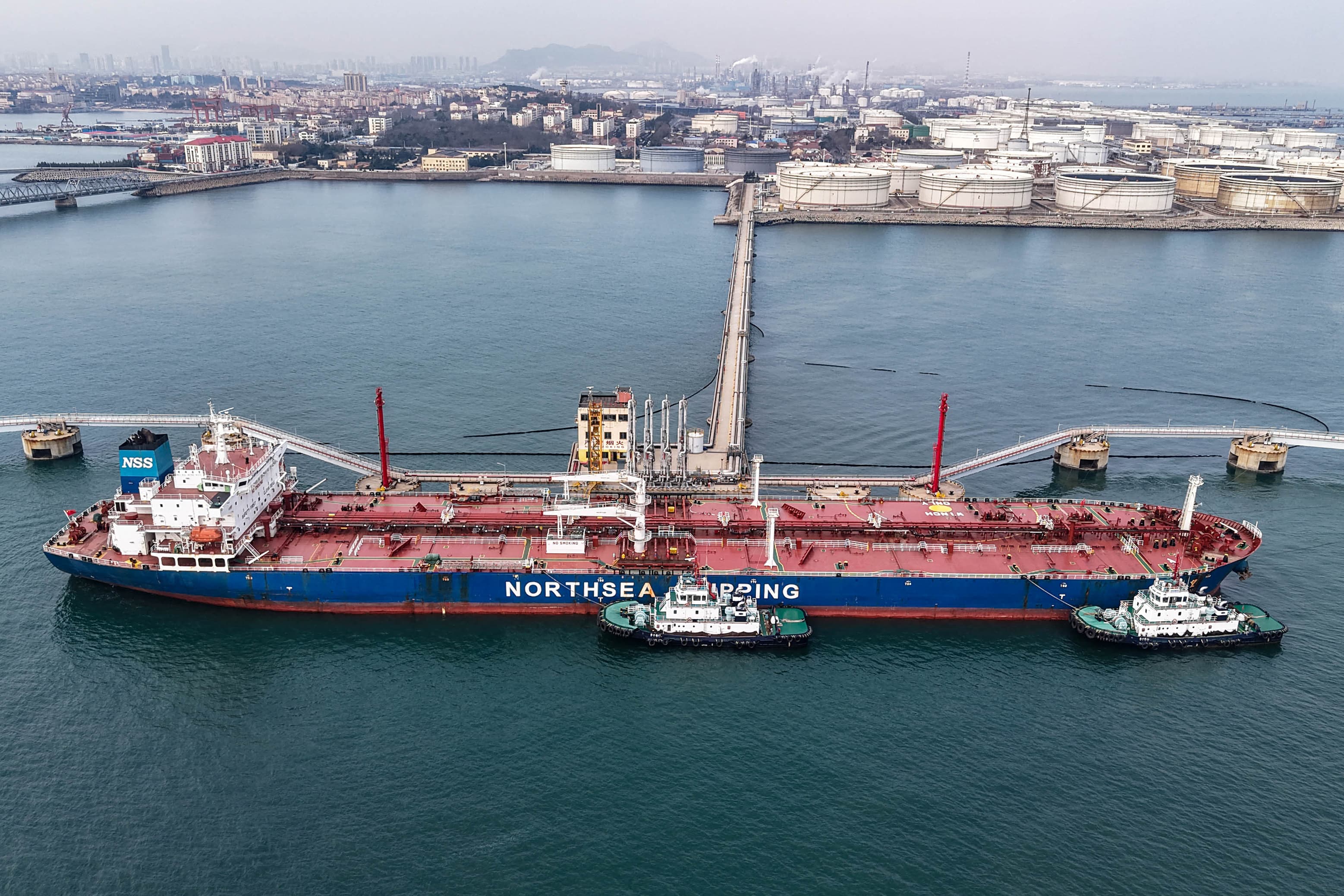 An oil tanker unloads crude oil at a terminal at the port in Qingdao, in China’s eastern Shandong province, on March 11, 2026. (Photo: AFP)