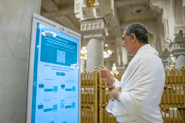 Saudi Arabia deploys AI robots at the Grand Mosque in Makkah and the Prophet’s Mosque in Madinah to guide pilgrims, answer questions and clean the holy sites. (Saudi Press Agency)