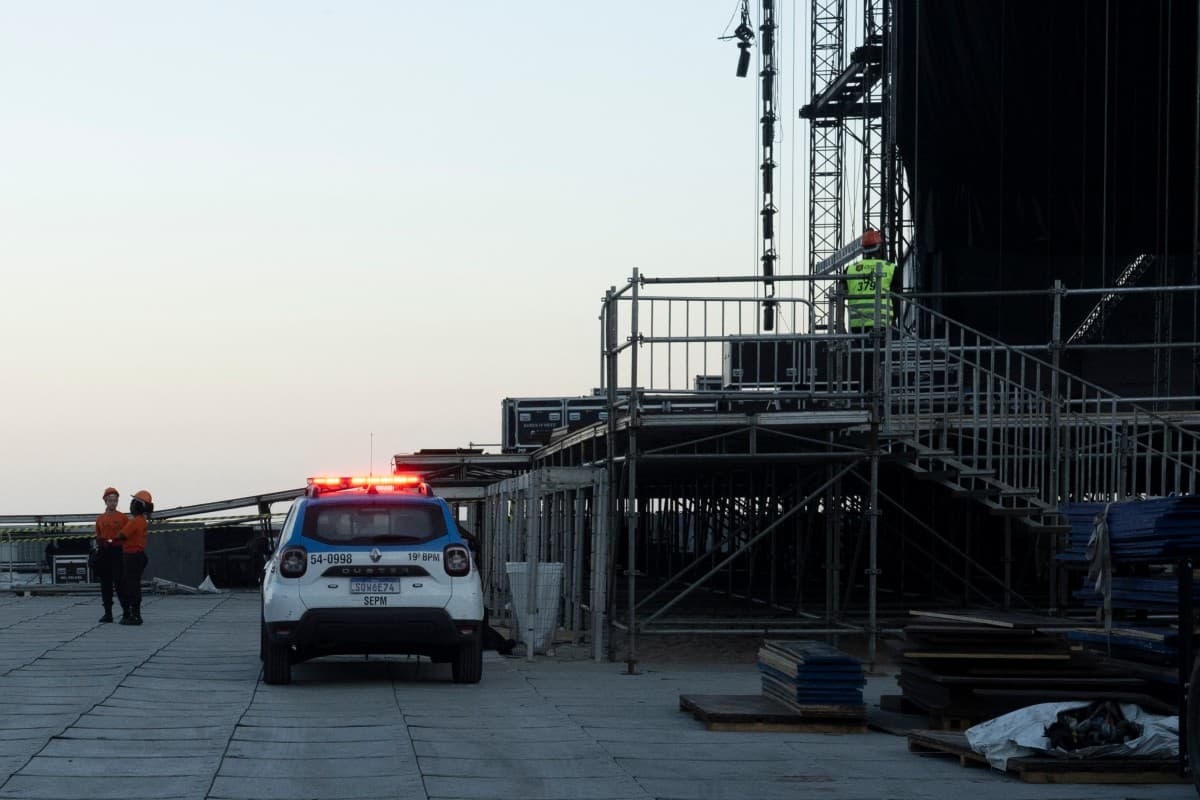 A police car is seen in front of the stage being set up for Colombian singer Shakira at Copacabana Beach in Rio de Janeiro, Brazil, on April 26, 2026, the Colombian singer is scheduled to perform on May 2.