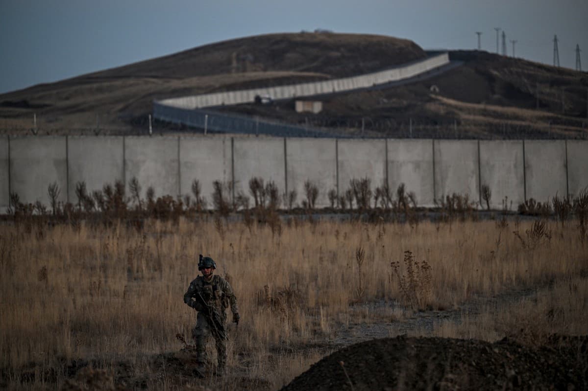 A Turkish soldier patrols near the border wall between Turkey and Iran in the Van Province, eastern Turkey, on November 1, 2024 (AFP)