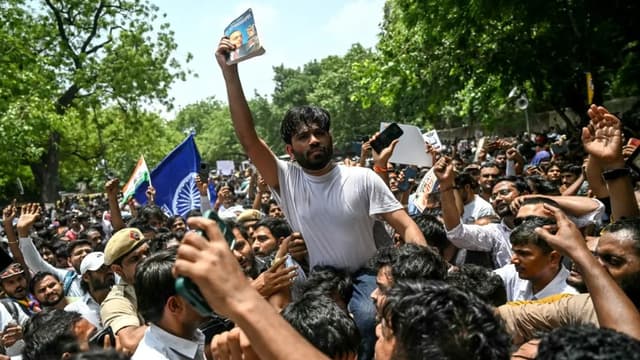 Cockroach Janta Party (CJP) founder Abhijeet Dipke (C) takes part in a protest over alleged irregularities in the country's major examinations, in New Delhi on June 6, 2026. (File photo: AFP)
