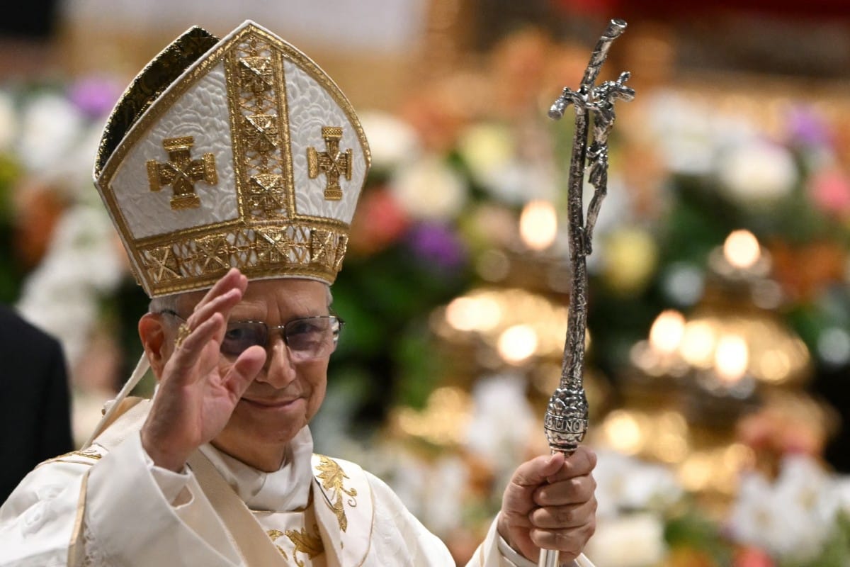 Pope Leo XIV greets people at the end of the Easter vigil as part of the Holy Week celebrations, at St Peter's basilica in the Vatican on April 4, 2026. (AFP)