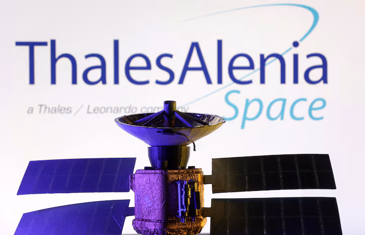 Thales Alenia Space logo and miniature satellite model are seen in this illustration taken, March 10, 2025. (Reuters)