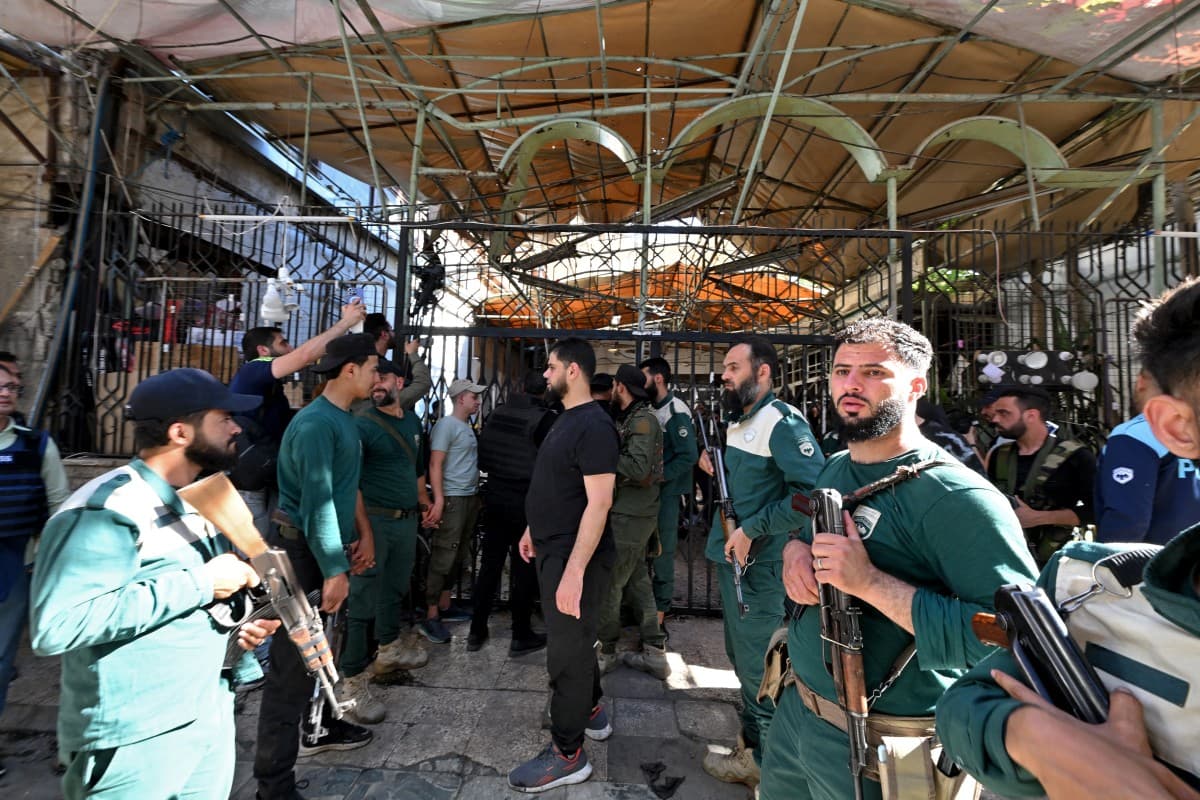 Bomb blast at Damascus cafe kills nine, authorities say