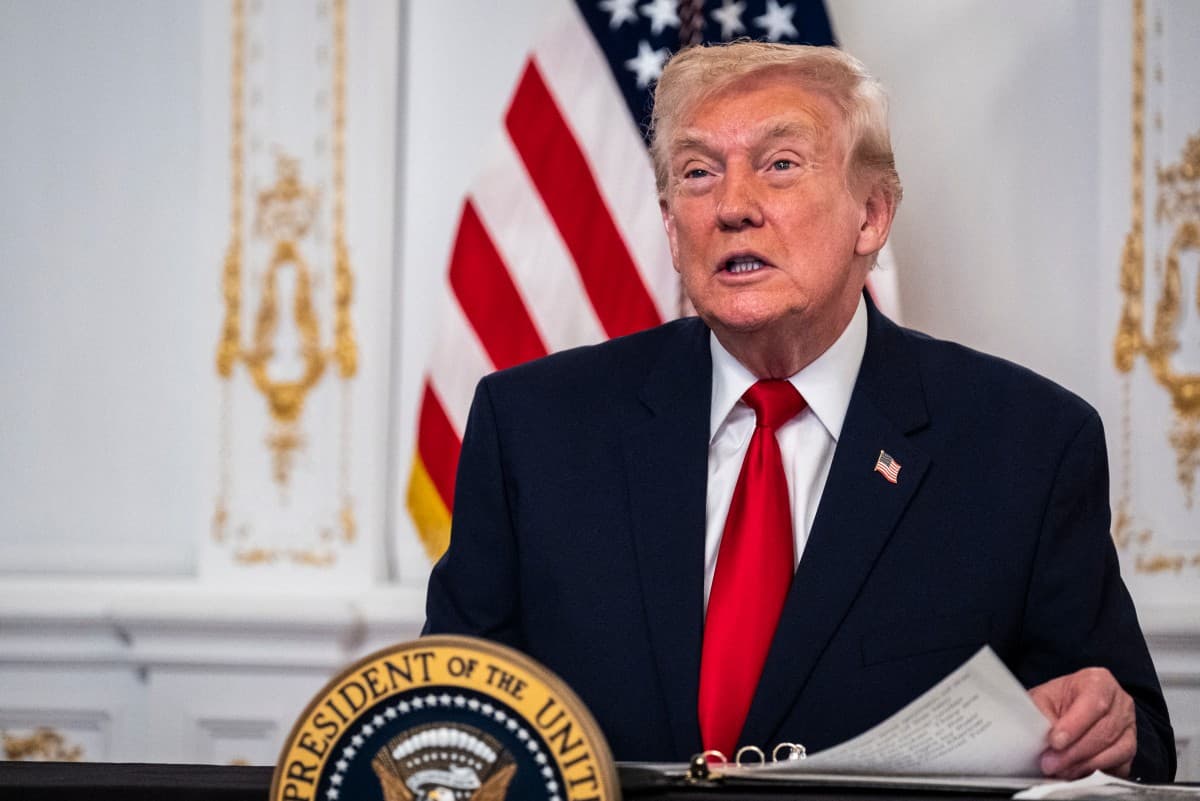 President Donald Trump participates in a call with U.S. service members from his Mar-a-Lago club in Florida on Thanksgiving Day on November 27, 2025 in Palm Beach, Florida. (Pete Marovich/Getty Images/AFP)