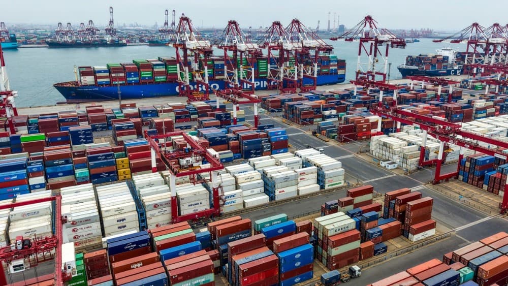 Containers are seen at the port in Qingdao, in east China’s Shandong province on September 21, 2026. STR / AFP (Photo by CN-STR / AFP) / CHINA OUT