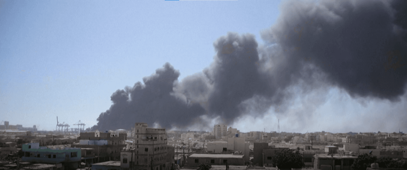 File Photo - Smoke billows after a drone strike on the port of Port Sudan on May 6, 2025. (AFP)