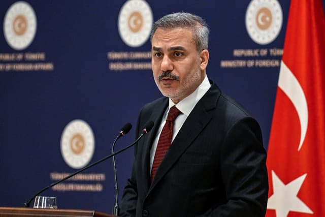 Turkish Minister of Foreign Affairs Hakan Fidan addresses the audience during a press briefing in Istanbul, on January 15, 2026. (Photo by OZAN KOSE / AFP)