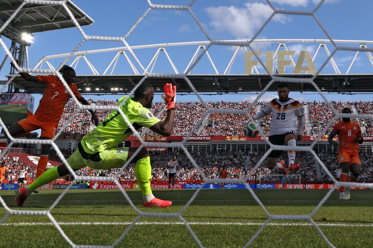 Germany come from behind to beat Ivory Coast and reach World Cup last 32