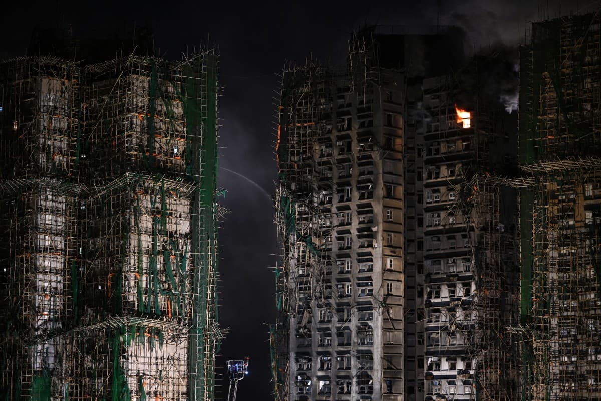 A general view shows the aftermath of a major fire that swept through several apartment blocks at the Wang Fuk Court residential estate in Hong Kong's Tai Po district on November 27, 2025. (AFP)