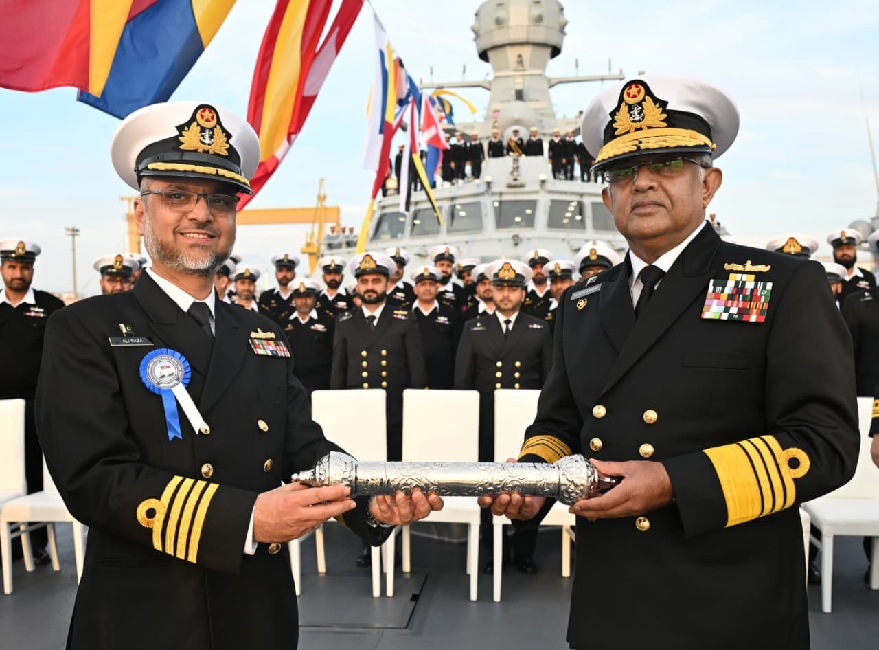 Chief of the Naval Staff Admiral Naveed Ashraf hands over Command scroll to CO PNS Khaibar during the commissioning ceremony held at Istanbul Naval Shipyard, Türkiye (X / DGPR Navy)