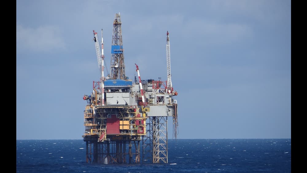 Oil prices dip, stocks rise on lingering Iran peace hopes