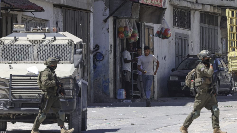Israeli army soldiers carry out a military operation at the Askar camp for Palestinian refugees, east of Nablus in the Israeli-occupied West Bank on September 4, 2026. (AFP)