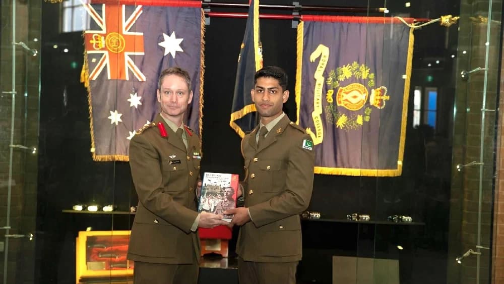 Pakistani Army Cadet Sardar Arsam Abbas receives the ‘Overall Best Foreign Military Cadet’ award from the Australian Royal Military College (RMC), Duntroon, during the passing out parade in Canberra. (Photo: ISPR)