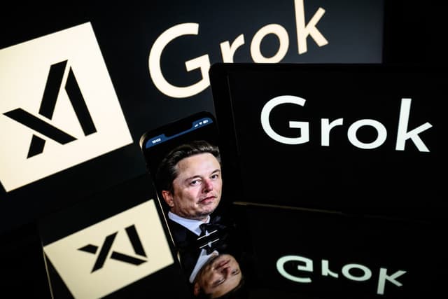 This photograph, taken on January 13, 2025, in Toulouse shows screens displaying the logo of Grok (AFP)
