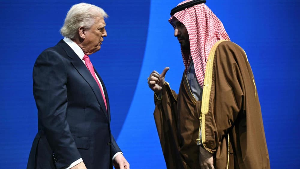 US President Donald Trump speaks with Crown Prince and Prime Minister of the Kingdom of Saudi Arabia Mohammed bin Salman at the US-Saudi Investment Forum at the John F Kennedy Center for the Performing Arts in Washington, DC on November 19, 2025. (AFP)