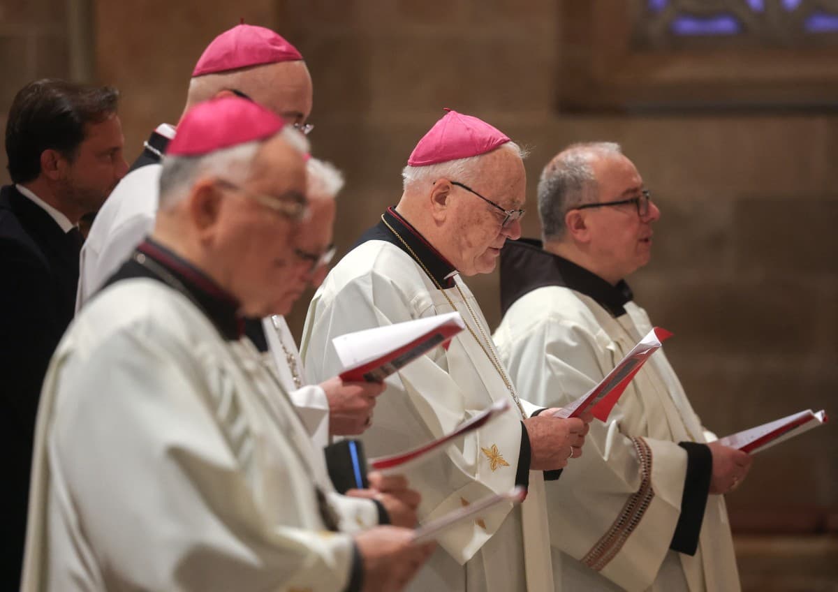 Members of the clergy attend a prayer service in the Church of All Nations held by Latin Patriarch of Jerusalem, Cardinal Pierbattista Pizzaballa, to mark Palm Sunday in Jerusalem on March 29, 2026, following the cancellation of the traditional Palm Sunda