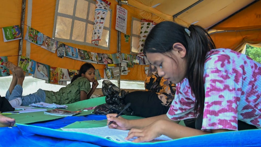 Children in flood-hit Nepal grapple with loss, cling to hope