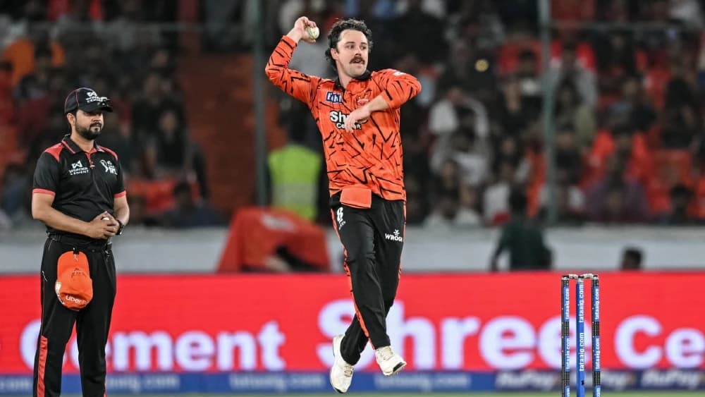 Sunrisers Hyderabad's Australian cricket player Travis Head delivers a ball during the 2026 Indian Premier League (IPL) T20 match between Sunrisers Hyderabad and Royal Challengers Bengaluru at the Rajiv Gandhi International Stadium in Hyderabad on May 22,