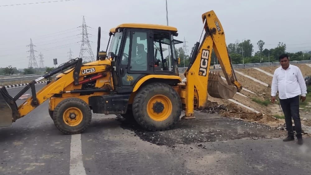 This screengrab shows a large section of the newly constructed Ganga Expressway link road in Unnao damaged after the season’s first monsoon rain. (Photo: X/@drshamamohd/AI enhanced)