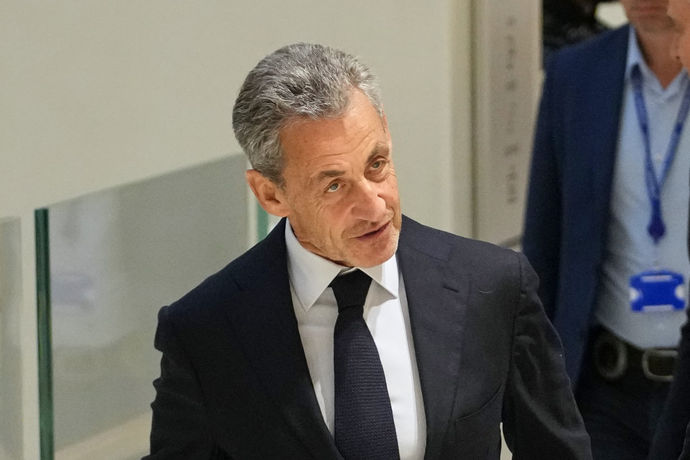 Former French President Nicolas Sarkozy arrives at the courthouse, in Paris, France,