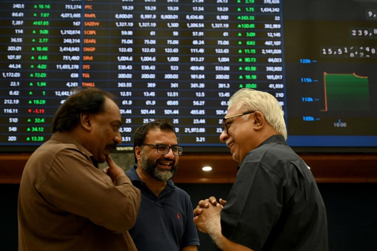 Stockbrokers interact during a trading session at Pakistan Stock Exchange (PSX) in Karachi on May 12, 2025. (AFP/File)
