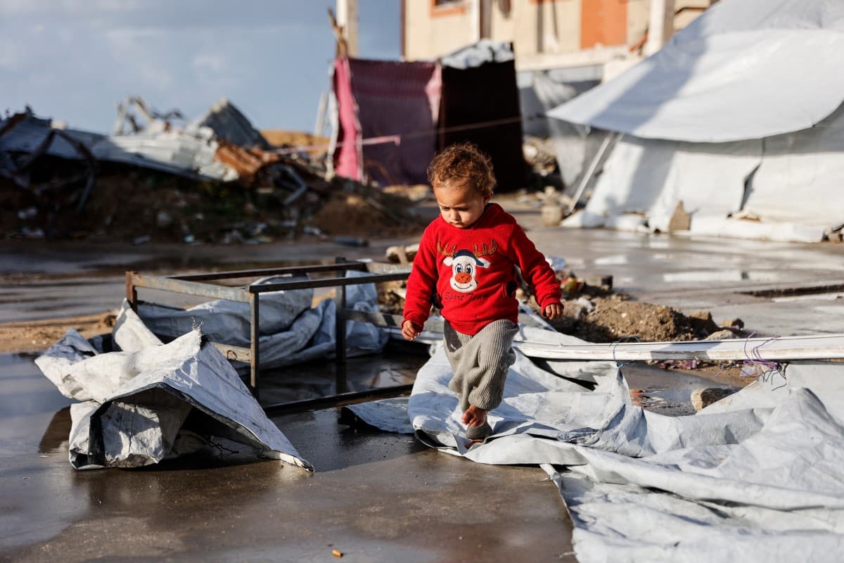 'Shivering from cold and fear': winter rains batter displaced Gazans