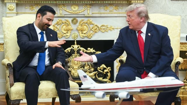 US President Donald Trump shakes hands with Prime Minister of Iraq Ali al-Zaidi (L) in the Oval Office of the White House in Washington, DC, on July 14, 2026. (Photo by SAUL LOEB / AFP)