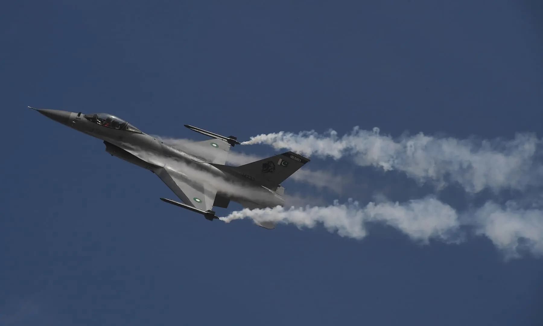 A Pakistan Air Force F-16 flies over Karachi during a ceremony to commemorate ‘Operation Swift Retort’. (AFP/File)